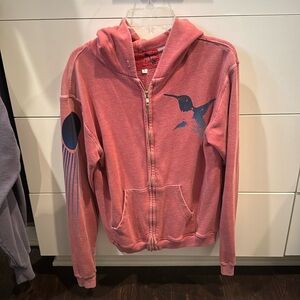 Free city red sweater